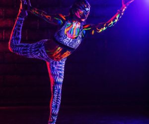 Glow-in-the-dark paint and yoga gives yogis more freedom and self-exploration