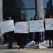 Students crowd outside faculty meeting to protest tuition increase