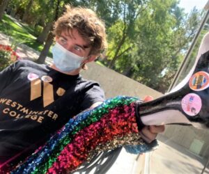 Westminster students sits in front of Shaw during campaign for ASW Election