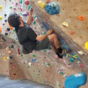 Noah Drake Duval participates in the self-scored bouldering competition April 8.