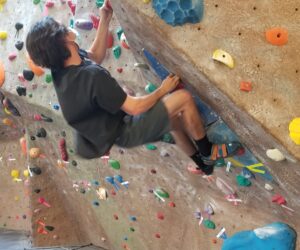 Noah Drake Duval participates in the self-scored bouldering competition April 8.