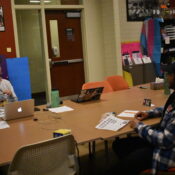 Jake Kirkwood, a white male student and Cris Mora Rubio, a black male student, sitting in a room.