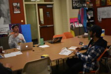 Jake Kirkwood, a white male student and Cris Mora Rubio, a black male student, sitting in a room.