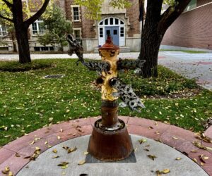 Large fire hydrant statues appear on campus