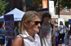 President Beth Dobkin smiling at the Student Wellness Fair in Richer Commons.